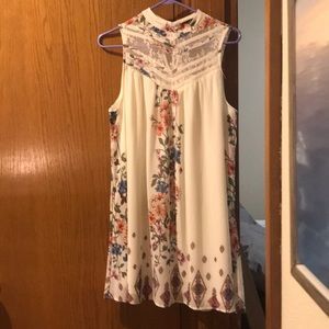 Very cute dress and brand new, never worn